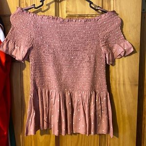 Off the shoulder ruffled/smocked top.